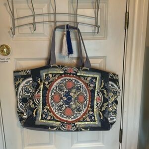 Fabulous cotton, oversized, duffel with inside zipper pocket.